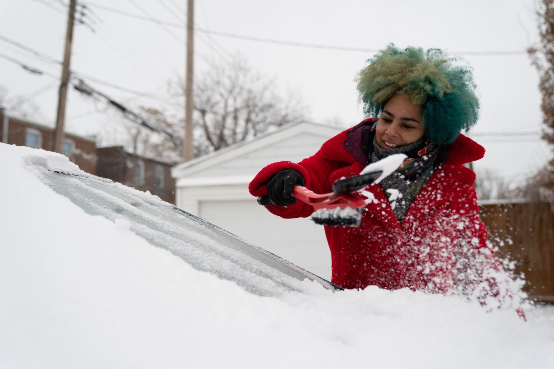 Scraping snow off car in St. Louis